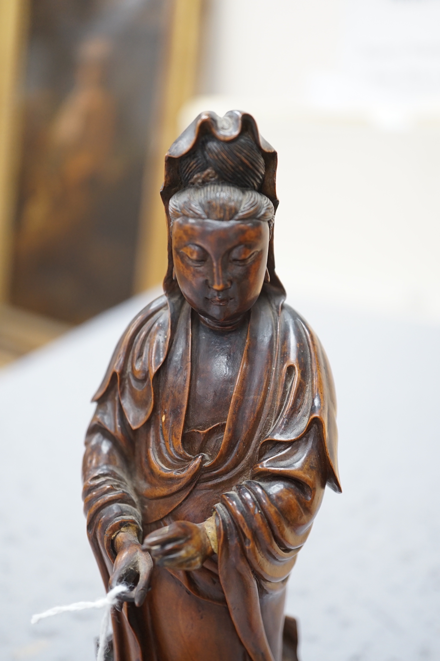 A Chinese boxwood figure of Guanyin, Qing dynasty, 22.5cm